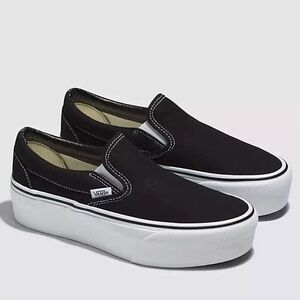 Platform slip-on Vans, black with white.
